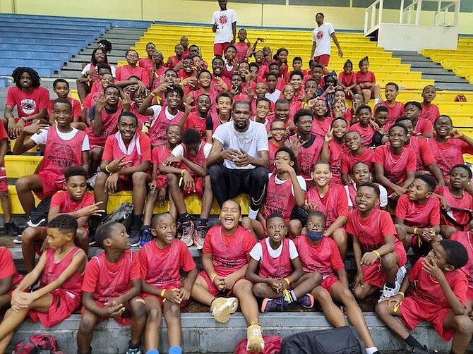 Kevin Durant meets campers at Kendal Isaacs