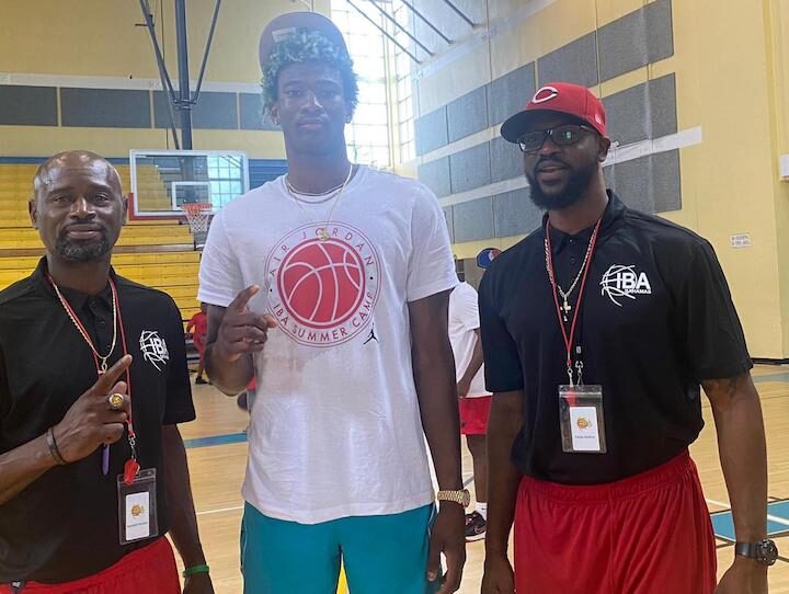Kai Jones flanked by Coach Ricardo Pierre & Coach Denykco Bowles